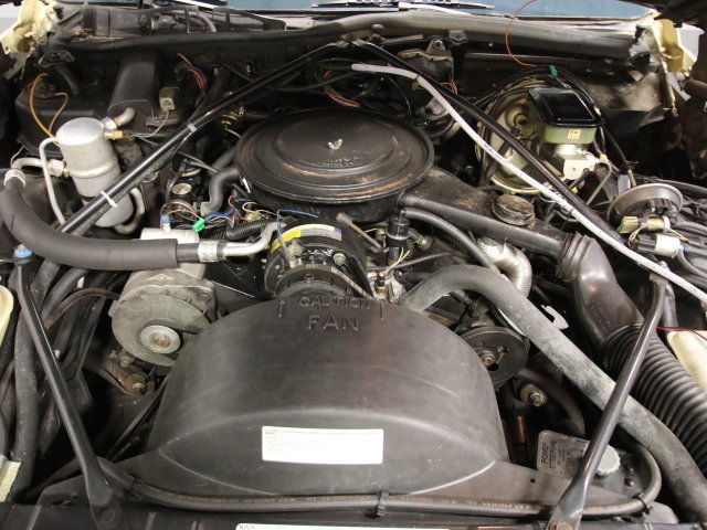 1982 Yellow Cadillac DeVille Coupe