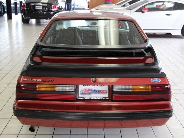 1984 Red Ford Mustang Hatchback