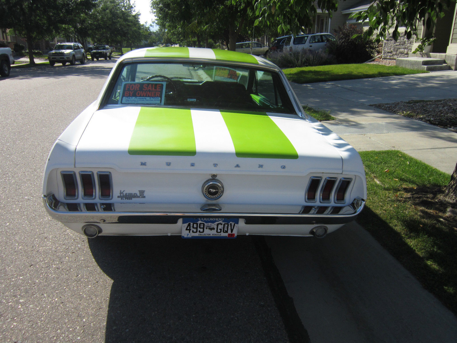1967 white with green racing stripes Ford Mustang Coupe
