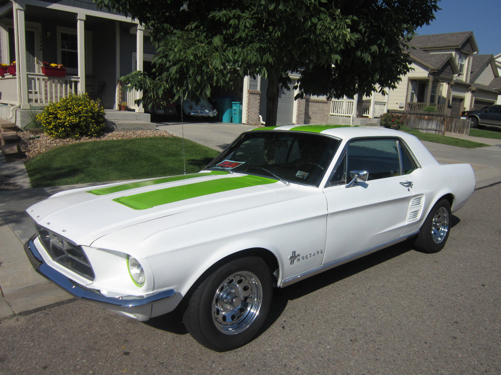 1967 white with green racing stripes Ford Mustang Coupe
