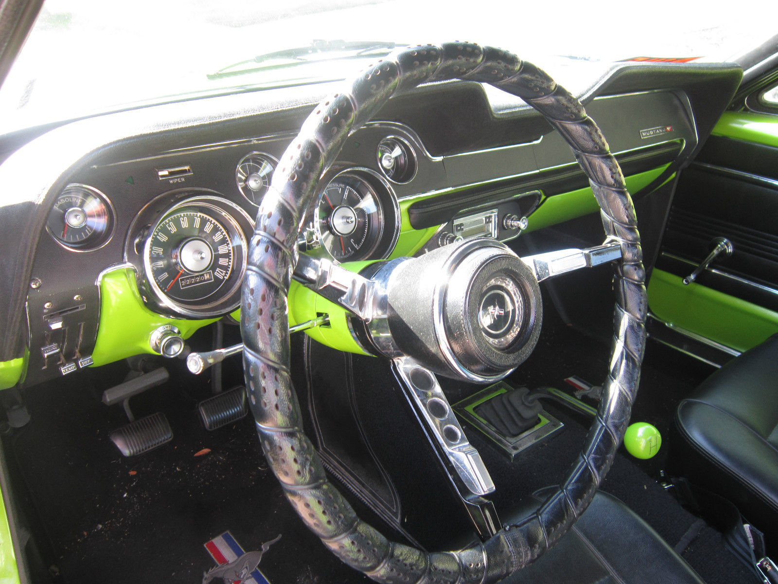 1967 white with green racing stripes Ford Mustang Coupe