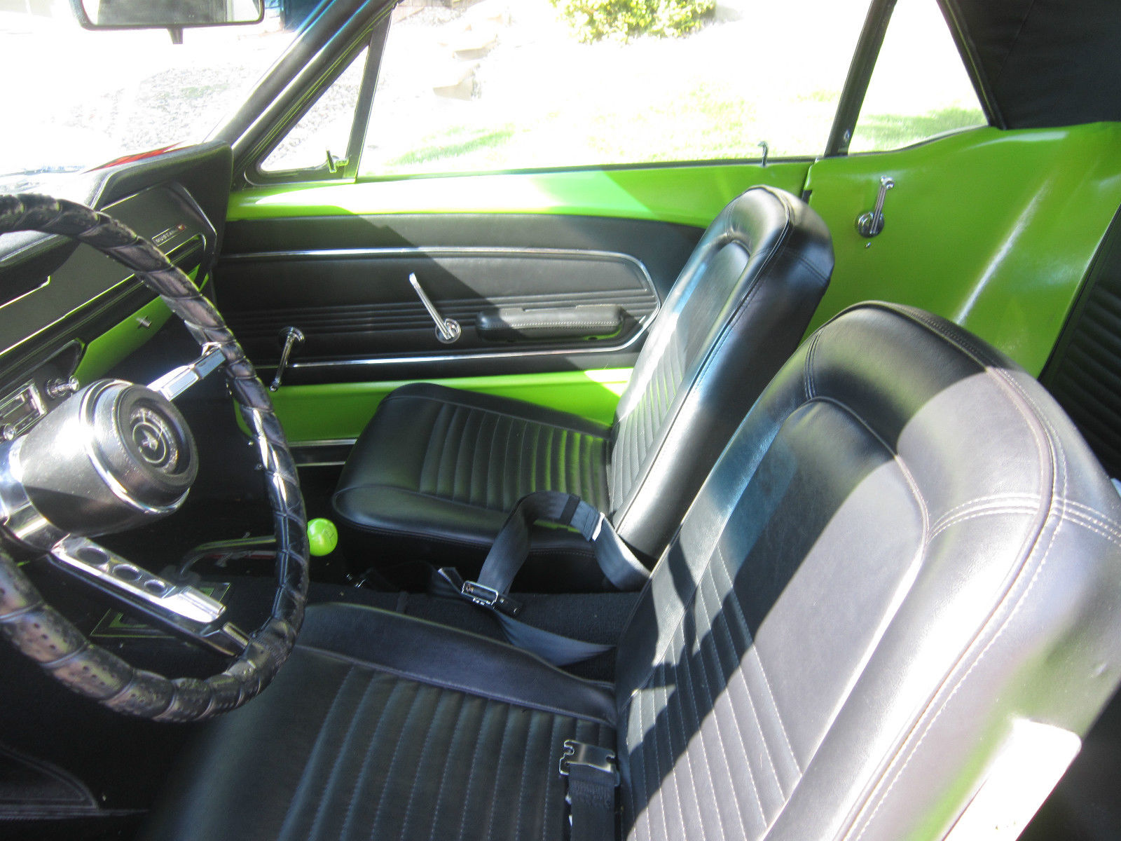 1967 white with green racing stripes Ford Mustang Coupe