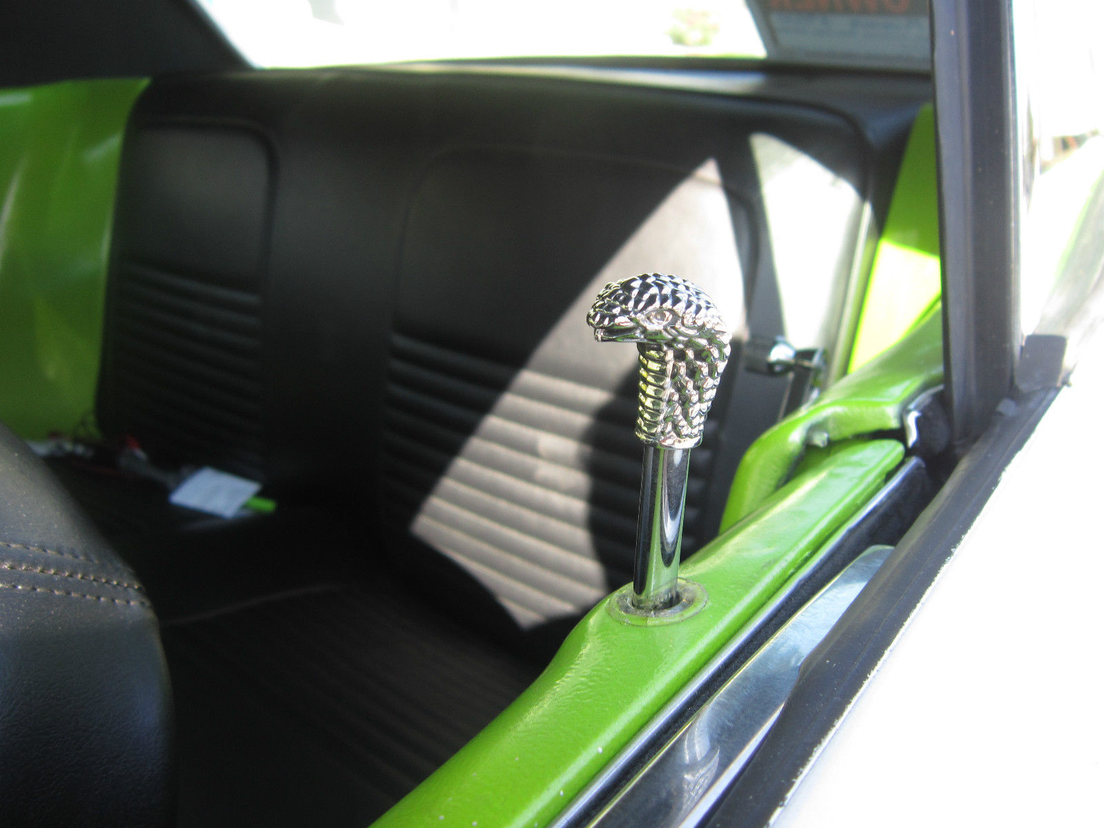 1967 white with green racing stripes Ford Mustang Coupe