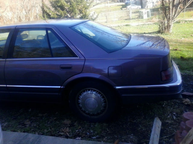 1994 Tan Cadillac Seville Sedan