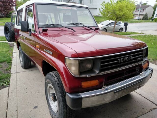 1990 Red Toyota Land Cruiser SUV