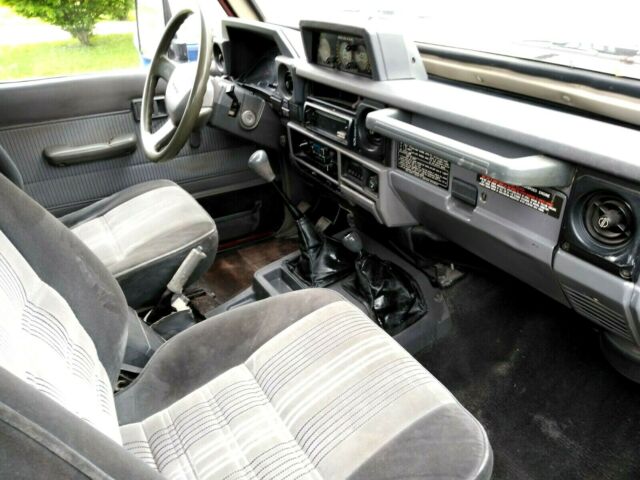 1990 Red Toyota Land Cruiser SUV