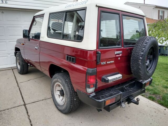 1990 Red Toyota Land Cruiser SUV