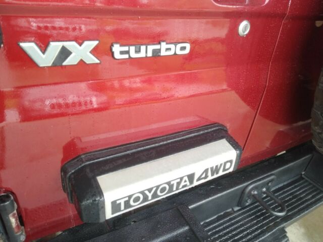 1990 Red Toyota Land Cruiser SUV