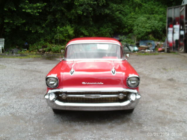 1957 Red Chevrolet Bel Air/150/210 Sedan