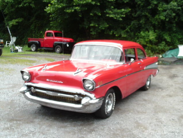 1957 Red Chevrolet Bel Air/150/210 Sedan