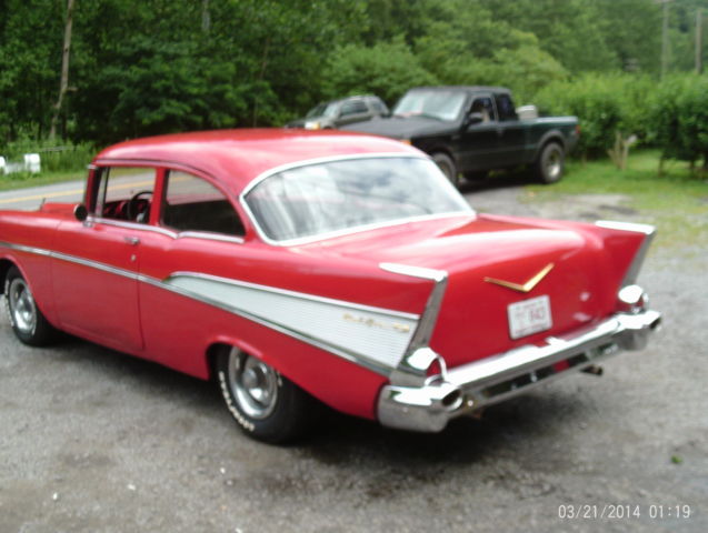 1957 Red Chevrolet Bel Air/150/210 Sedan