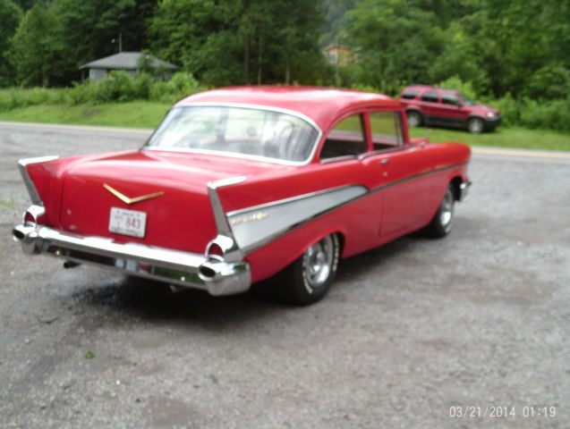 1957 Red Chevrolet Bel Air/150/210 Sedan