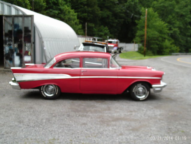 1957 Red Chevrolet Bel Air/150/210 Sedan