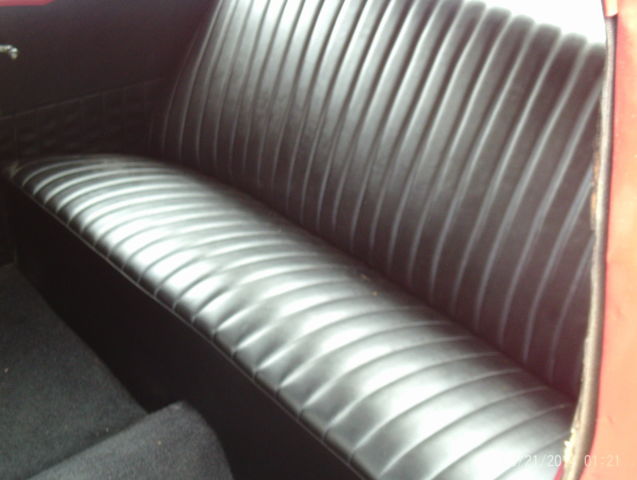 1957 Red Chevrolet Bel Air/150/210 Sedan