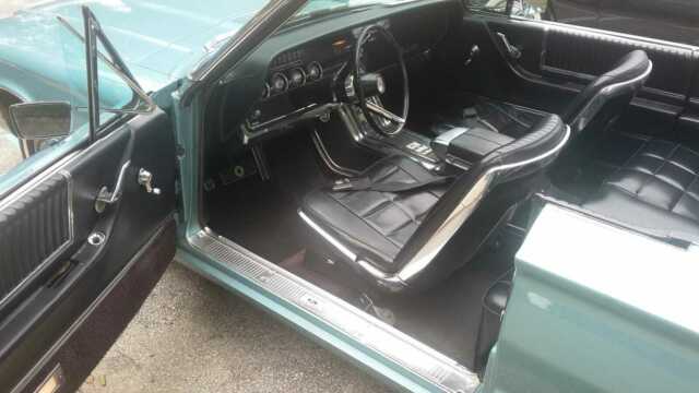 1966 Teal Ford Thunderbird Convertible