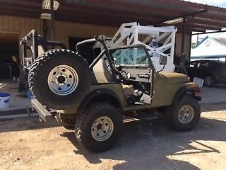 1980 camo green Jeep CJ SUV