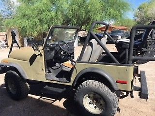 1980 camo green Jeep CJ SUV