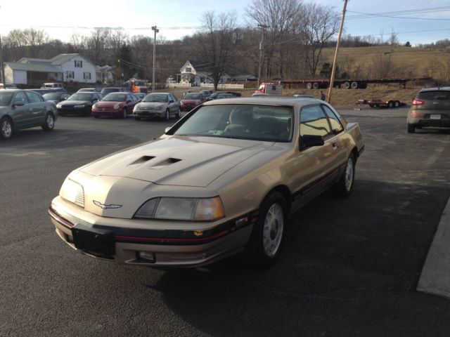 1988 Gold Ford Thunderbird Coupe