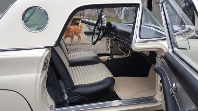 1957 black and white Ford Thunderbird Convertible
