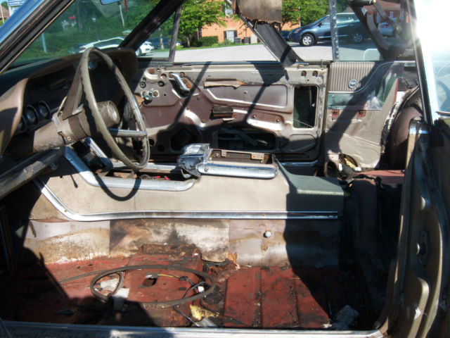 19650000 Gold Ford Thunderbird Convertible