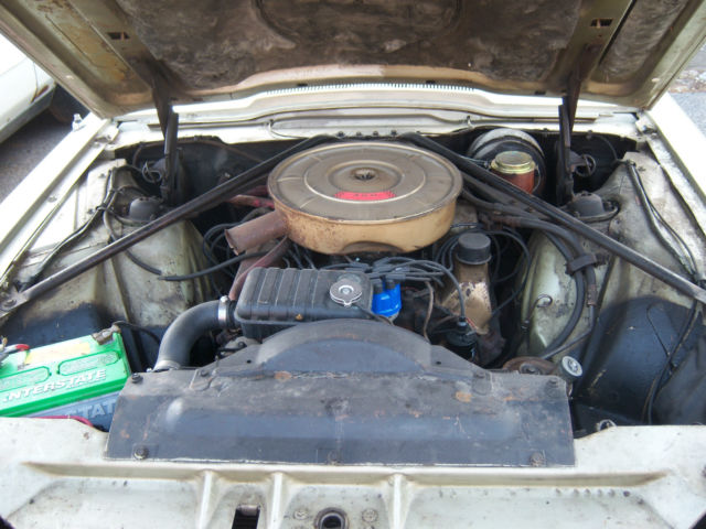 19650000 Gold Ford Thunderbird Convertible