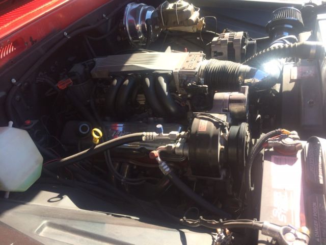 1961 red/white trim Chevrolet C-10 Standard Cab Pickup