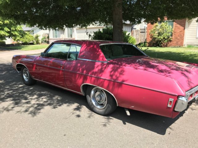 1969 Red Chevrolet Impala Custom