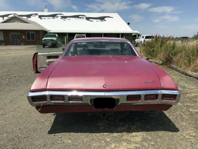 1969 Red Chevrolet Impala Custom