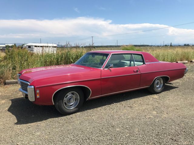 1969 Red Chevrolet Impala