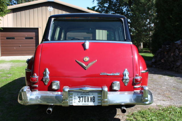 1953 red and black Chrysler Town & Country Wagon