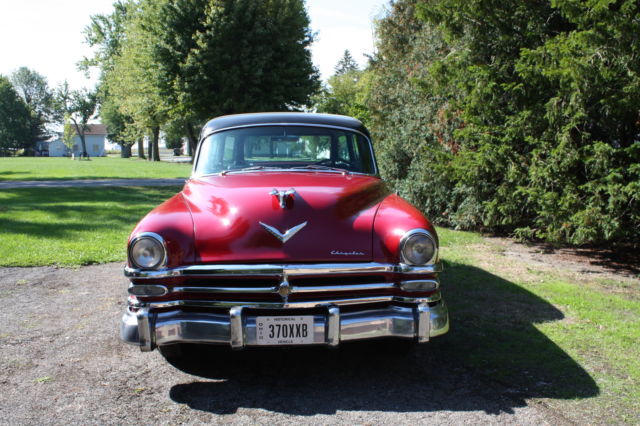 1953 red and black Chrysler Town & Country Wagon