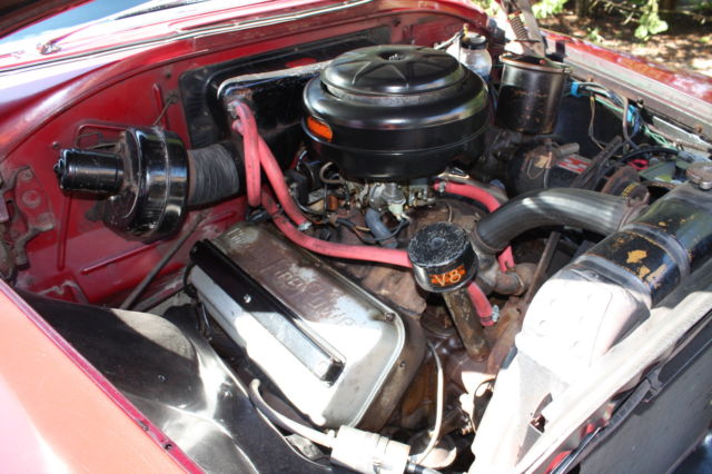 1953 red and black Chrysler Town & Country Wagon