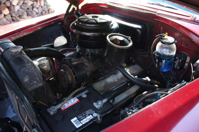 1953 red and black Chrysler Town & Country Wagon