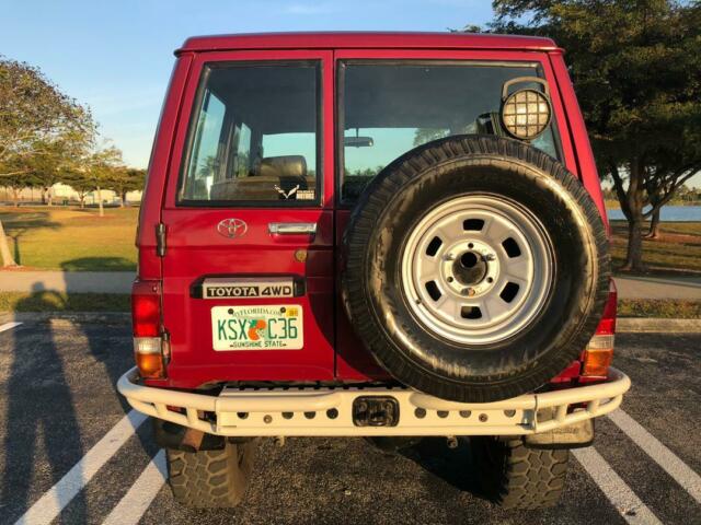 1993 Red Toyota Land Cruiser SUV