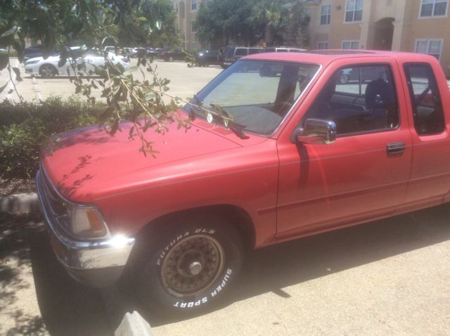 1990 Red Toyota Tacoma Extended Cab Pickup