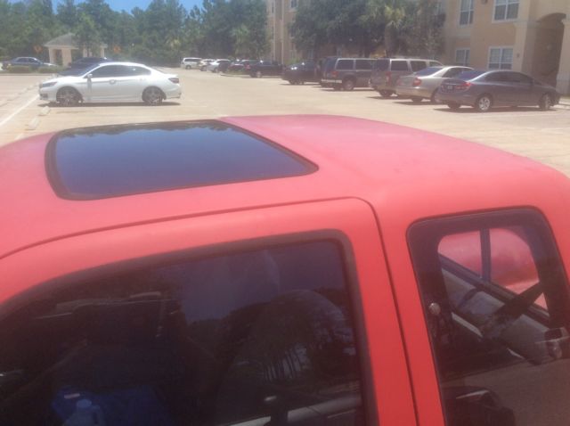 1990 Red Toyota Tacoma Extended Cab Pickup