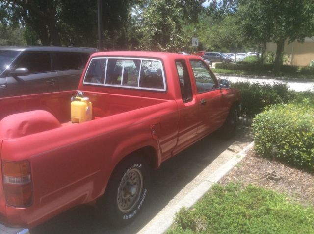 1990 Red Toyota Tacoma Extended Cab Pickup