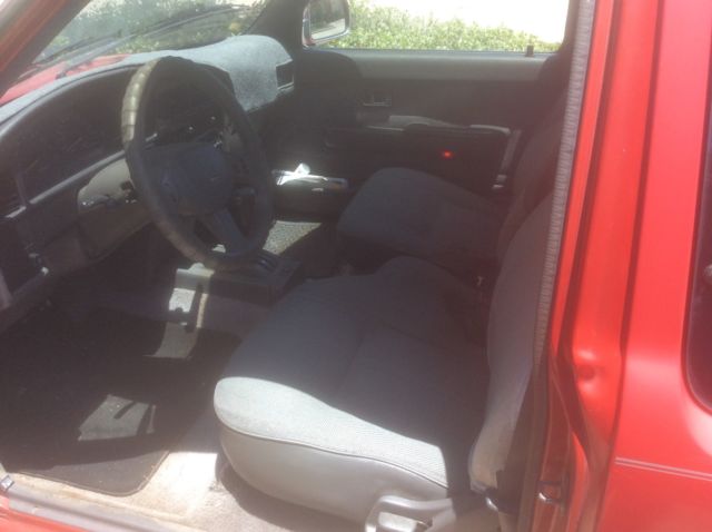 1990 Red Toyota Tacoma Extended Cab Pickup