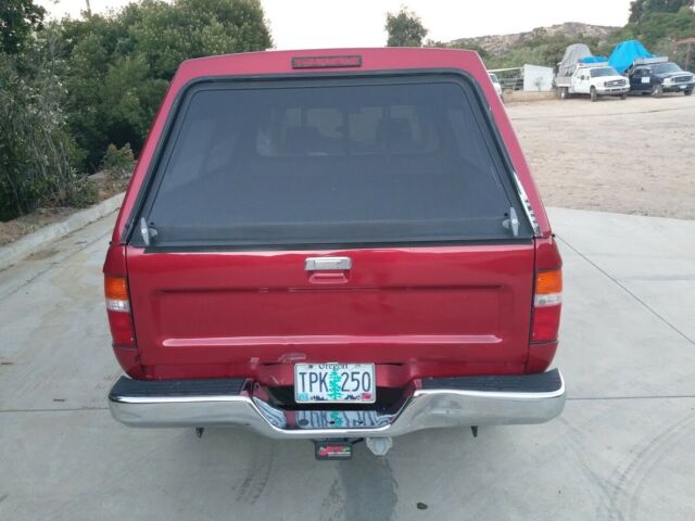 1993 Maroon Toyota Tacoma Extended Cab Pickup