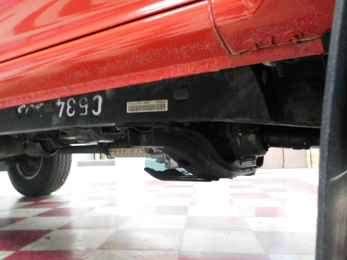 1994 Red Toyota Pickup Pickup Truck