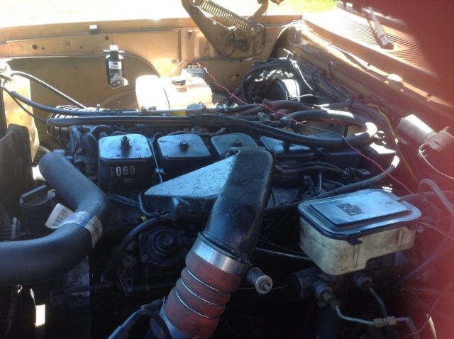 1985 gold and cream Dodge Ram 3500 Crew Cab Pickup