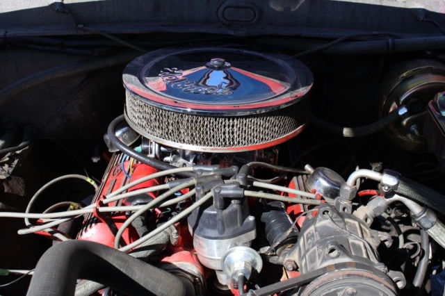 1970 Red and White Ford F-100 Standard Cab Pickup