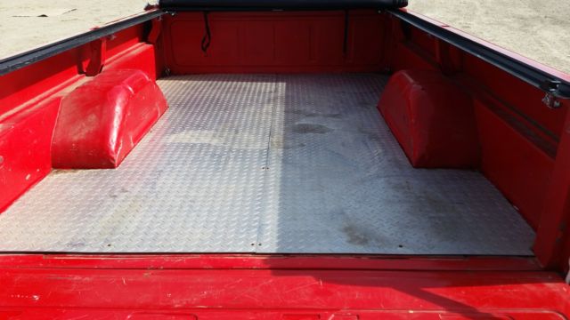 1970 Red and White Ford F-100 Standard Cab Pickup