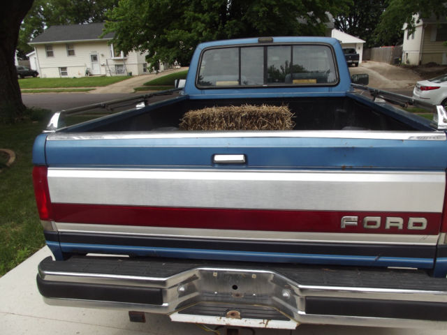 1989 blue Ford F-150 Standard Cab Pickup