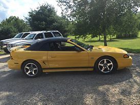 1994 Yellow Ford Mustang Convertible