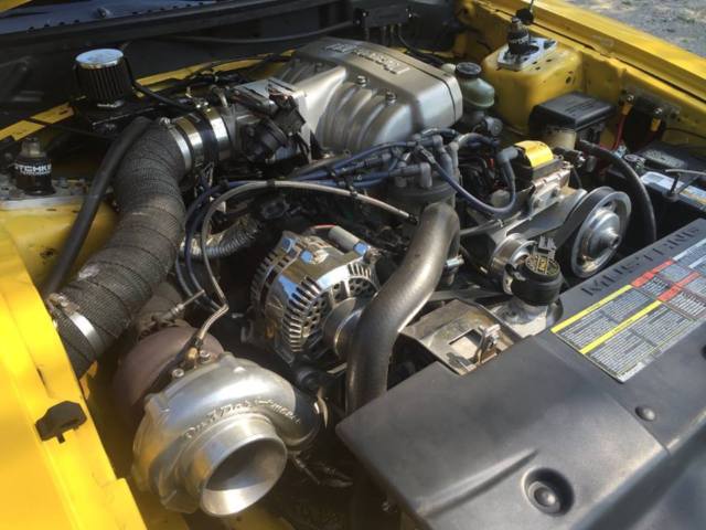 1994 Yellow Ford Mustang Convertible