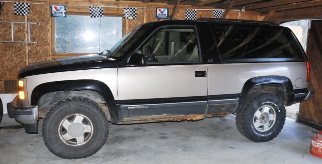 1994 tan/black GMC Yukon 2 door