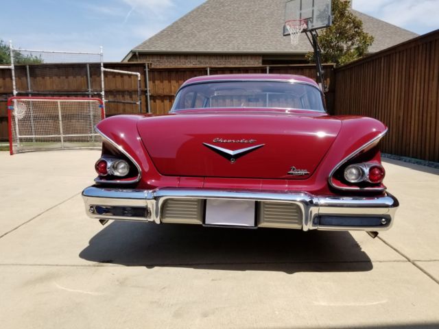 1958 Maroon Chevrolet Bel Air/150/210 Coupe