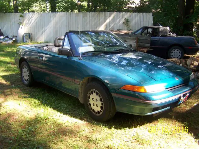 TWO MERCURY CAPRI CONVERTIBLES 1991 AND A 1993 For Sale Photos