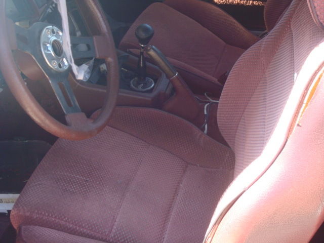 1984 charcoal gray Mazda RX-7 Coupe